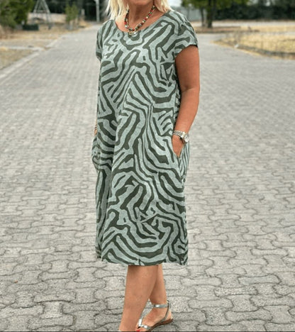 Solina™ – Kleid mit Rundhalsausschnitt und wunderschönem, bauchbedeckendem Print