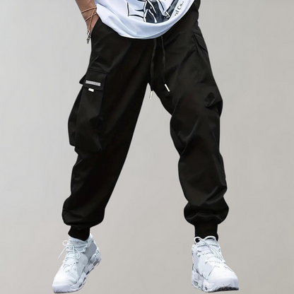 Sommerfeld™ | Herren Cargo Jogginghose – Lila Streetwear-Hose mit Reißverschlusstaschen & Bündchen